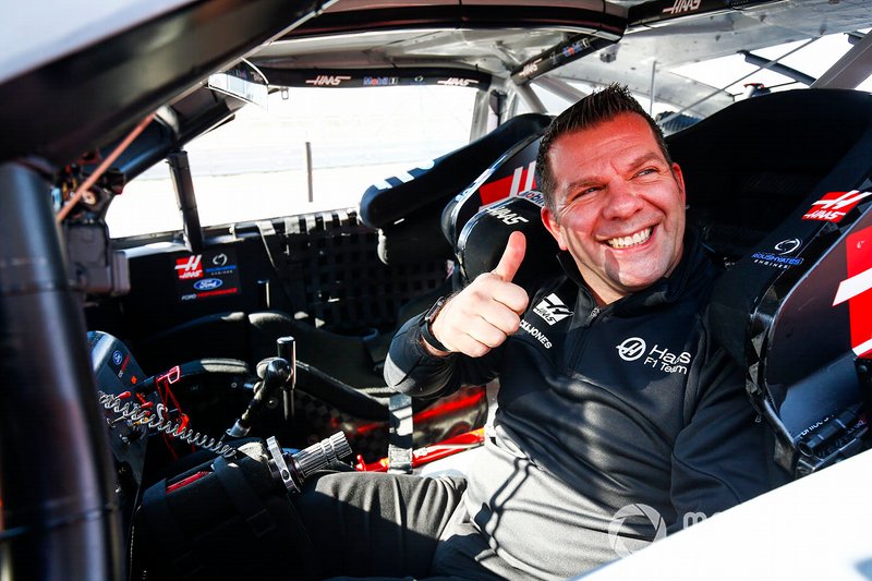 Peter Crolla sits in a NASCAR Cup car