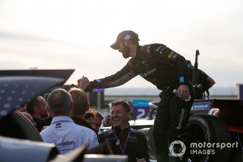 Race winner Sam Bird, Virgin Racing celebrates with his team on the podium