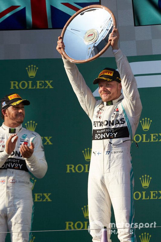 Valtteri Bottas, Mercedes AMG F1, 1st position, holds his trophy high