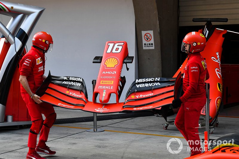 Ferrari Mechanics with Ferrari SF90 front wing
