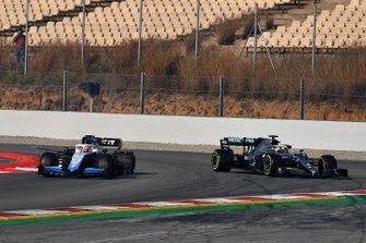 Robert Kubica, Williams FW42 and Lewis Hamilton, Mercedes-AMG F1 W10