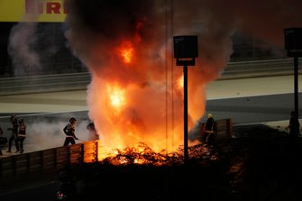 The crashed car of Romain Grosjean, Haas VF-20 on fire
