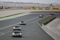 Cars of Honda Racing Team JAS leaves the pits