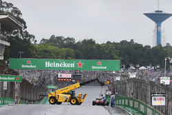 The Ferrari SF16-H of Kimi Raikkonen, Ferrari is removed from the circuit after he crashed out of th