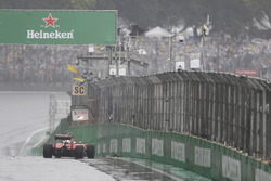 The crashed car of Kimi Raikkonen, Ferrari SF16-H, causes a stoppage