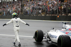 Felipe Massa, Williams FW38 waves to the crowd after he crashed out of the race
