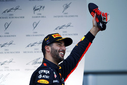 Daniel Ricciardo, Red Bull Racing, celebrates his victory on the podium, champagne in his shoe