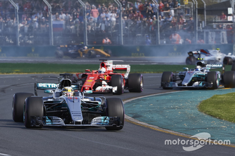 Lewis Hamilton, Mercedes AMG F1 W08, leads Sebastian Vettel, Ferrari SF70H, and Valtteri Bottas, Mercedes AMG F1 W08