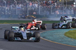 Lewis Hamilton, Mercedes AMG F1 W08, leads Sebastian Vettel, Ferrari SF70H, and Valtteri Bottas, Mercedes AMG F1 W08