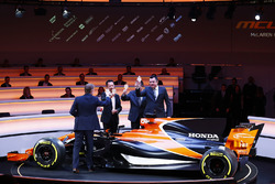 L-R: Presenter Simon Lazenby, Yusuke Hasegawa, Senior Managing Officer, Honda, Zak Brown, Executive Director of McLaren Technology Group, and Eric Boullier, Racing Director, McLaren, toast the MCL32
