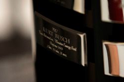 The name of Kurt Busch, Stewart-Haas Racing Ford on the Daytona 500 trophy
