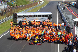 Group photo of marshals with Max Verstappen, Red Bull Racing