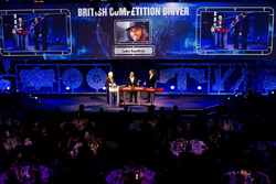 Nick Hamilton accepts the British Competition driver of the year award on behalf of his brother Lewis Hamilton