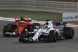 Felipe Massa, Williams FW40, leads Kimi Raikkonen, Ferrari SF70H