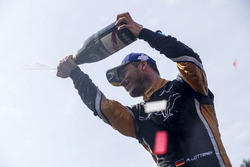 Andre Lotterer, Techeetah enjoys his Mumm Champagne on the podium