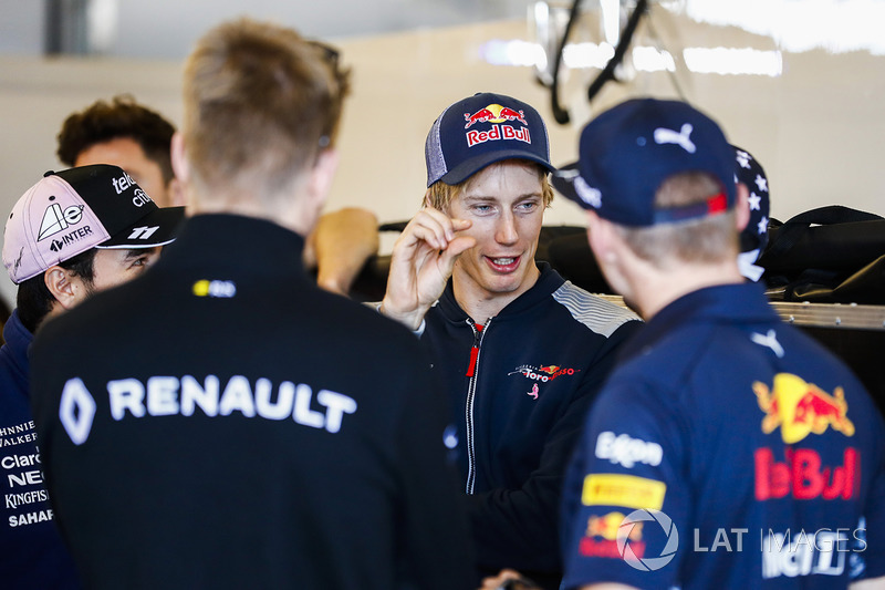 Brendon Hartley, Scuderia Toro Rosso, talks with Max Verstappen, Red Bull