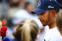 Lewis Hamilton, Mercedes AMG F1, speaks to the media
