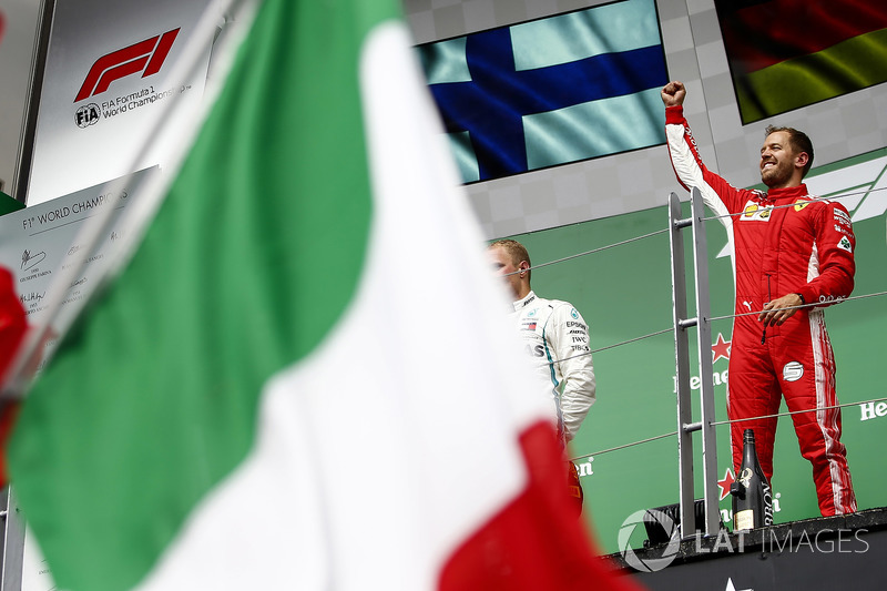 Sebastian Vettel, Ferrari, 1st position, celebrates on the podium