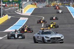 The Safety Car leads Lewis Hamilton, Mercedes AMG F1 W09, Max Verstappen, Red Bull Racing RB14, Carlos Sainz Jr., Renault Sport F1 Team R.S. 18, and Daniel Ricciardo, Red Bull Racing RB14