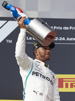 Lewis Hamilton, Mercedes AMG F1, 1st position, with his trophy on the podium