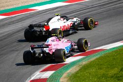 Kevin Magnussen, Haas F1 Team VF-18, battles with Esteban Ocon, Force India VJM11