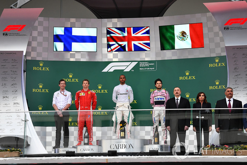 Kimi Raikkonen, Ferrari, Lewis Hamilton, Mercedes-AMG F1 and Sergio Perez, Force India on the podium