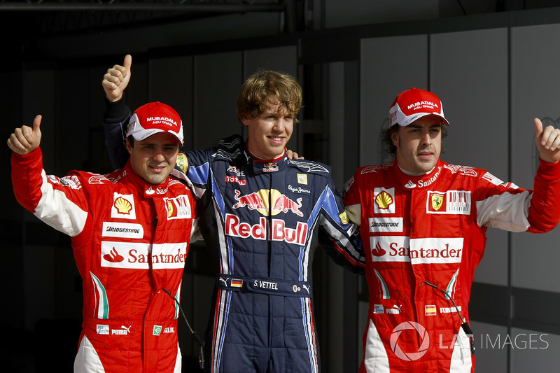 Sebastian Vettel, Red Bull Racing RB6 Renault celebrates with Felipe Massa, Ferrari F10 and Fernando Alonso, Ferrari F10 after taking Pole Position