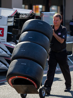 Mechanic with Firestone tires