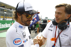 Fernando Alonso, McLaren on the grid with Jost Capito, McLaren Chief Executive Office