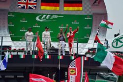 The podium (L to R): second place Lewis Hamilton, Mercedes AMG F1; Race winner Nico Rosberg, Mercede