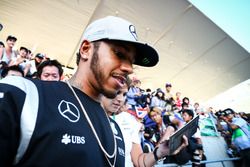 Lewis Hamilton, Mercedes AMG F1 signs autographs for the fans in the grandstand