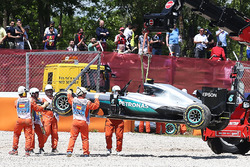 The Mercedes AMG F1 W07 Hybrid of race retiree Nico Rosberg, Mercedes AMG F1 is craned away from the gravel trap at the start of the race