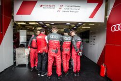 Audi Sport Team Joest team members block the view on the #7 Audi Sport Team Joest Audi R18