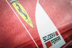 Ferrari logo covererd in rain drops