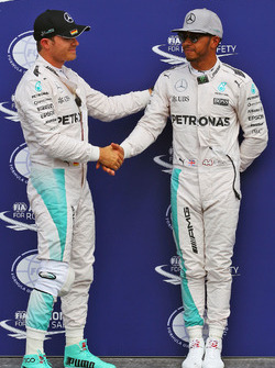 Nico Rosberg, Mercedes AMG F1 celebrates his pole position in parc ferme with second placed team mat