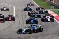 Lando Norris, Carlin, leads Sergio Sette Camara, Carlin and the rest of the field at the start of the race