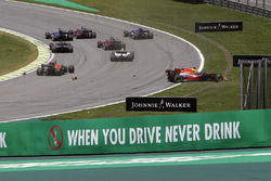 Daniel Ricciardo, Red Bull Racing RB13 and Stoffel Vandoorne, McLaren MCL32 collide at the start of the race