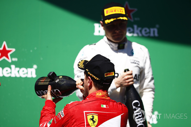 Podium: winner Sebastian Vettel, Ferrari, second place Valtteri Bottas, Mercedes AMG F1