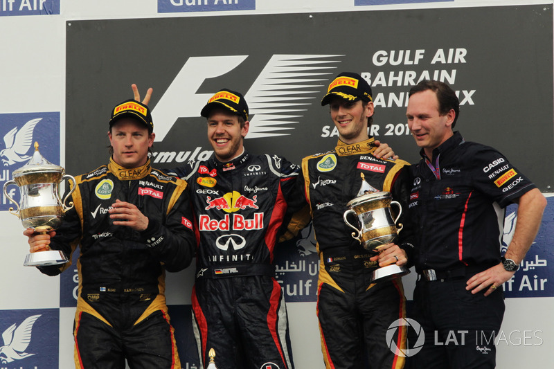 Podium: tweede Kimi Raikkonen, Lotus F1 Team, winnaar Sebastian Vettel, Red Bull Racing, Romain Gros