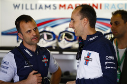 Robert Kubica, Williams Martini Racing, talks to colleagues