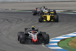 Kevin Magnussen, Haas F1 Team VF-18, leads Nico Hulkenberg, Renault Sport F1 Team R.S. 18, and Romain Grosjean, Haas F1 Team VF-18