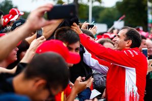 Marc Gene, Ferrari, signs autographs for fans