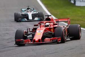 Sebastian Vettel, Ferrari SF71H, leads Lewis Hamilton, Mercedes AMG F1 W09