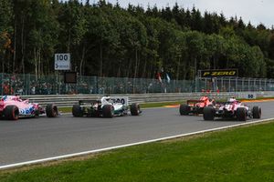 Sergio Perez, Racing Point Force India VJM11, Lewis Hamilton, Mercedes AMG F1 W09, Sebastian Vettel, Ferrari SF71H and Esteban Ocon, Racing Point Force India VJM11 battle on lap one