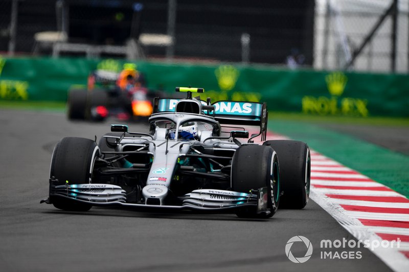 Valtteri Bottas, Mercedes AMG W10, leads Alex Albon, Red Bull RB15