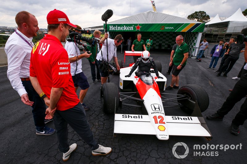 Sebastian Vettel, Ferrari looking at the McLaren MP4/4 with Martin Brundle, Sky TV