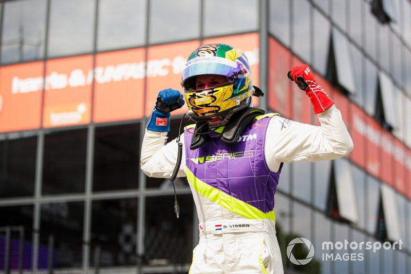Beitske Visser celebrates in Parc Ferme after winning the race