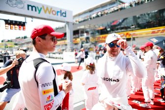 Lando Norris, McLaren, and Valtteri Bottas, Mercedes AMG F1, on the grid