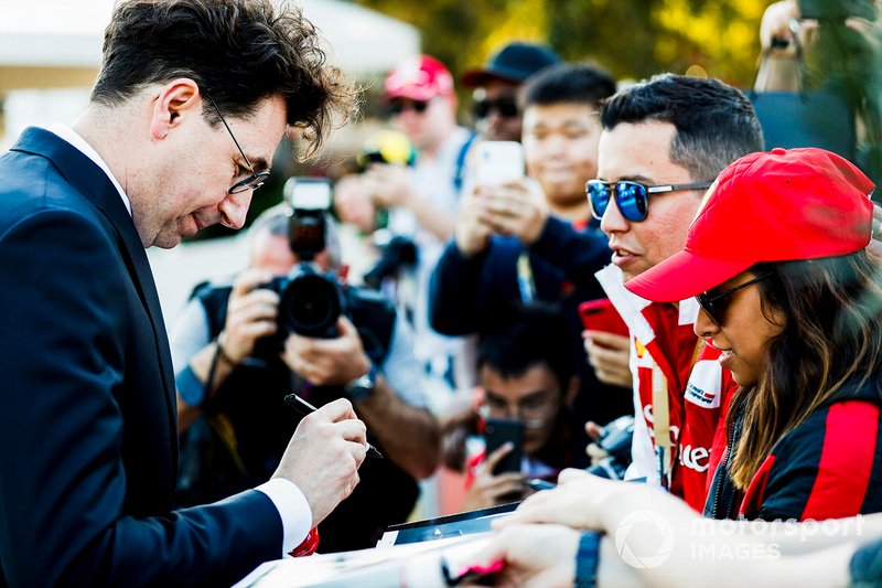 Mattia Binotto, Team Principal Ferrari signs an autograph for a fan