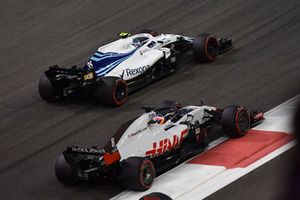 Romain Grosjean, Haas F1 Team VF-18 and Sergey Sirotkin, Williams FW41 battle 